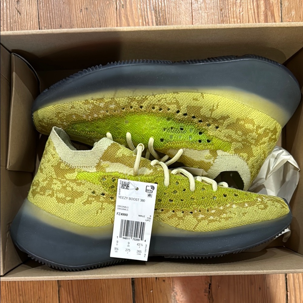 Adidas Yellow and Black Athletic Shoes with Modern Knit Design